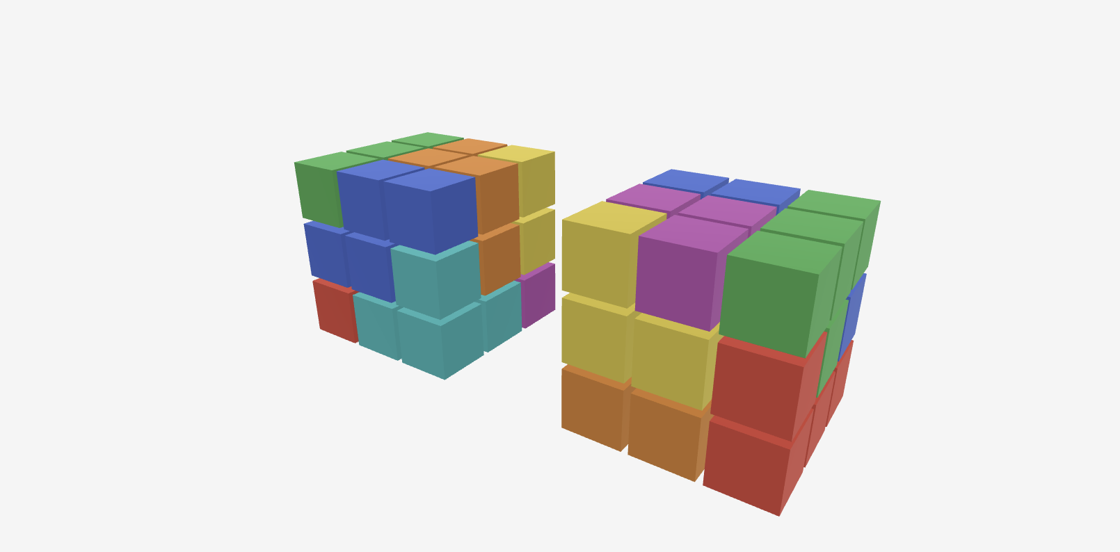 Two Soma cube solutions side by side, showing a solution and its mirror image which are considered equivalent